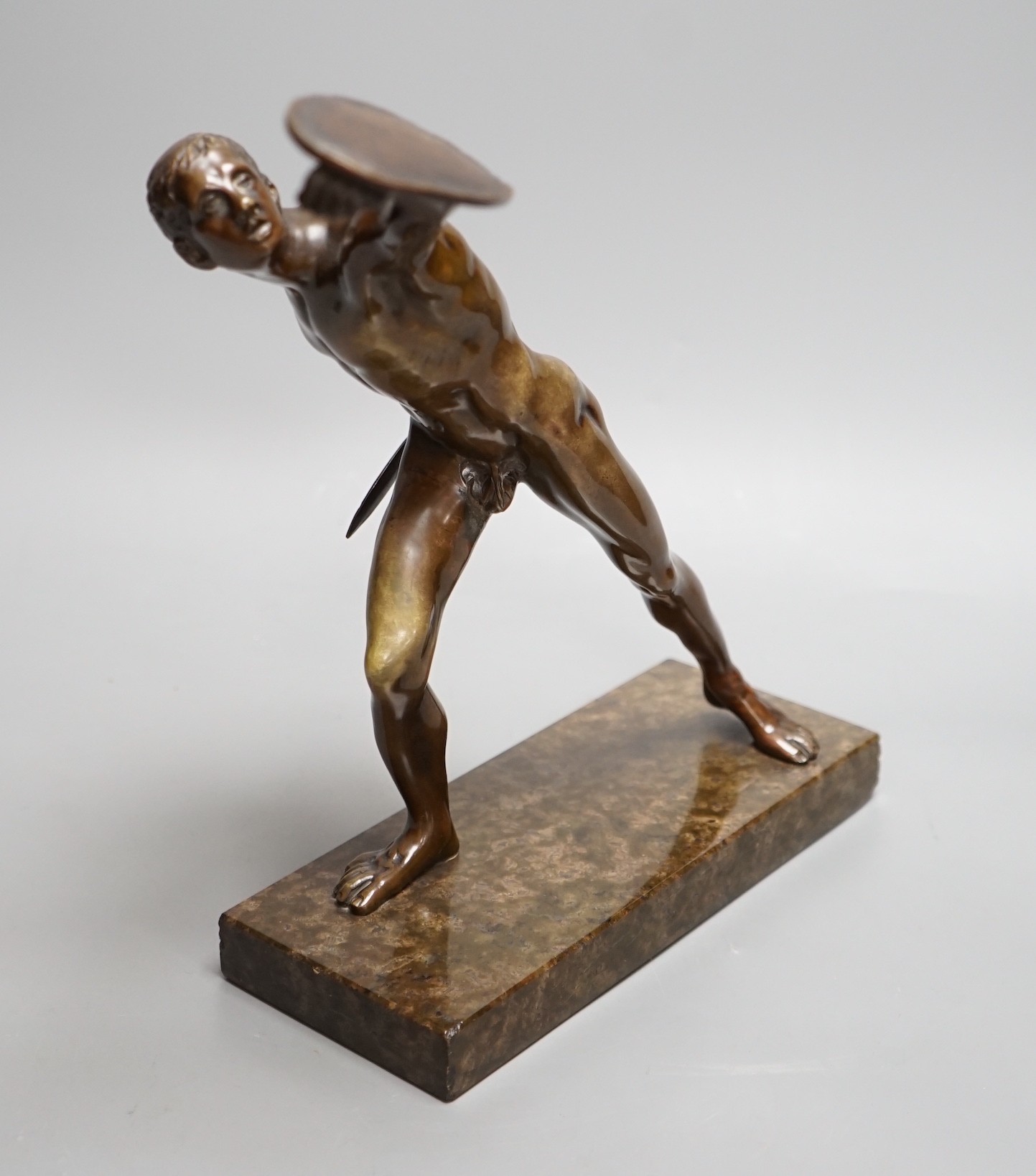 After the Antique, an early 20th century bronze study of the Borghese Gladiator, on marble base, 26cm tall